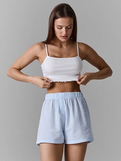 картинка Топ на тонких бретелях белого цвета в рубчик для женщин от магазина стильной одежды Mark Formelle