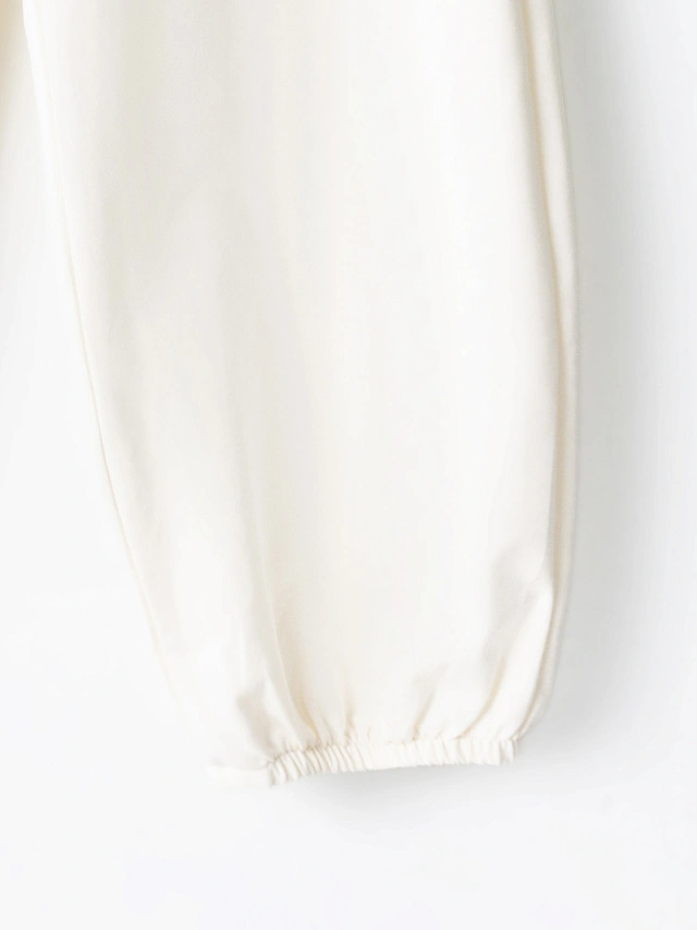 Брюки-джоггеры спортивные женские молочные свободного кроя - 9