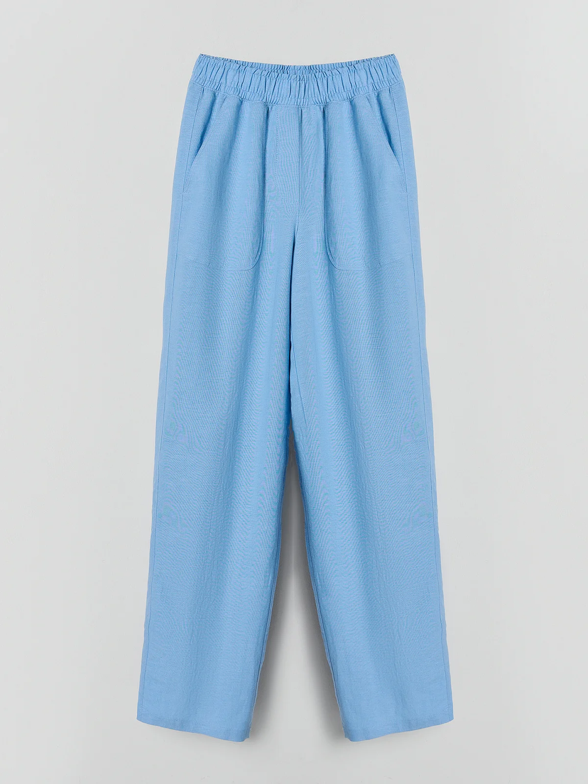 Брюки женские голубые с накладными карманами льняные